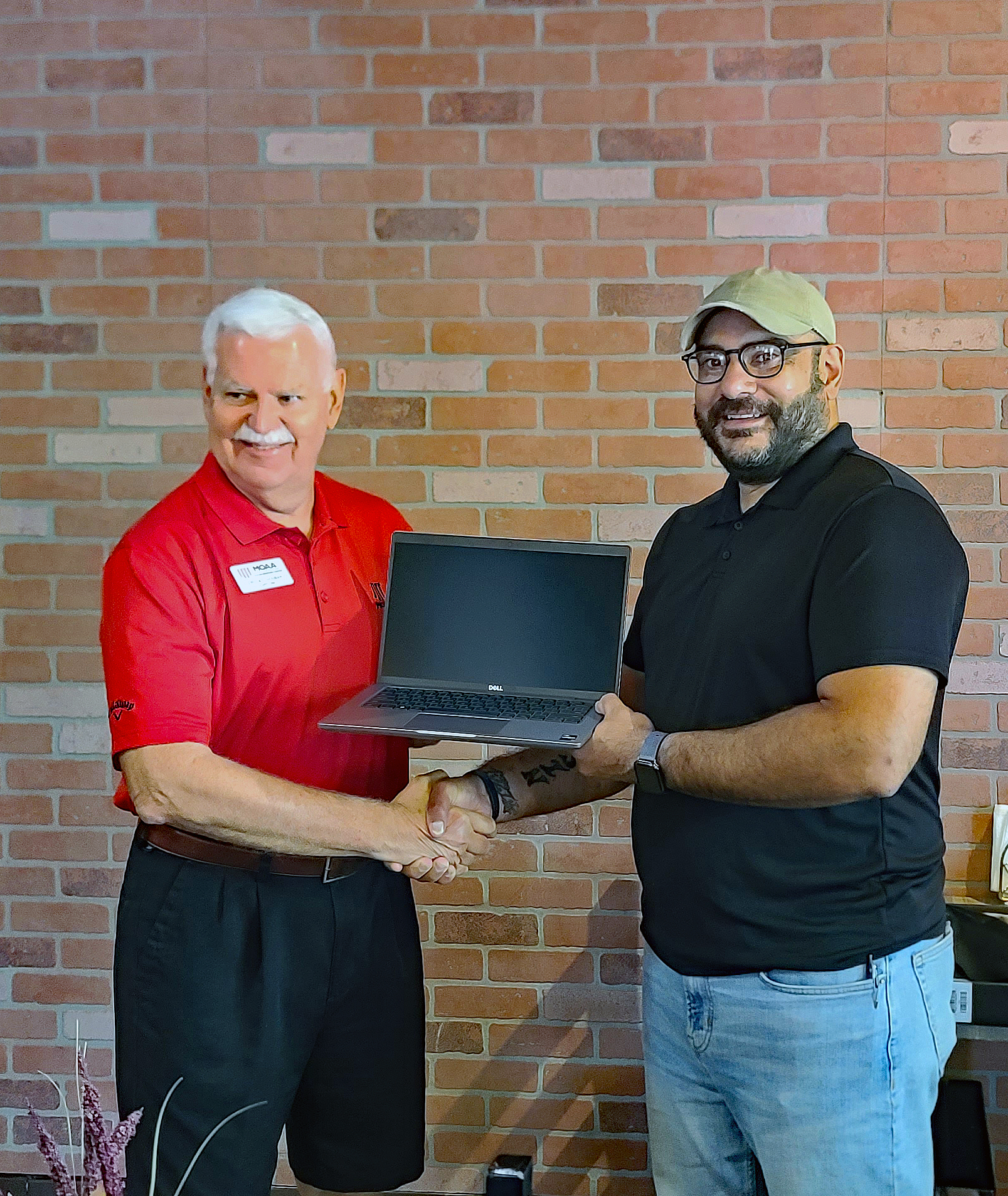 A EEE resident receives a new laptops